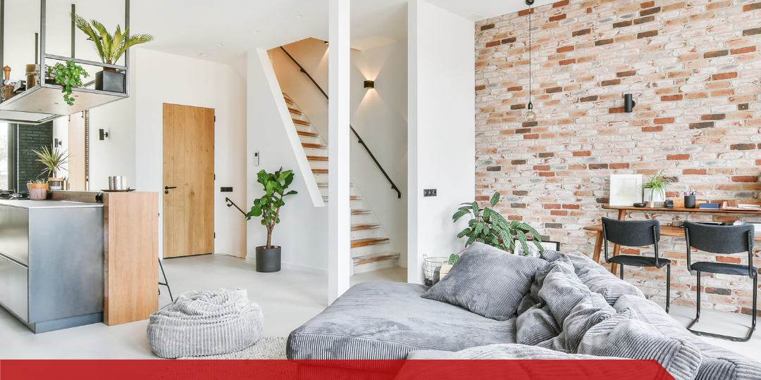 In-House Inspections LLC Maximize Your Sale_ Share Home Inspection Reports with Sellers a living room filled with furniture and a brick wall