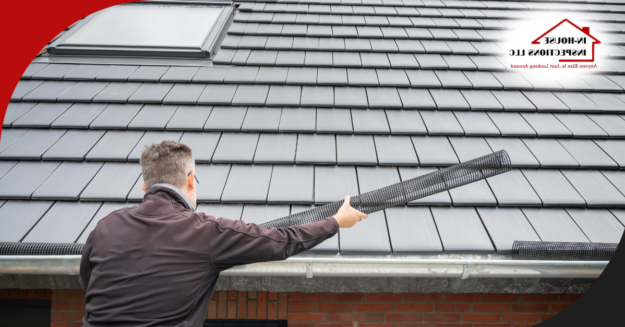 In-House Inspections LLC Inspector installing a gutter guard on a roof.